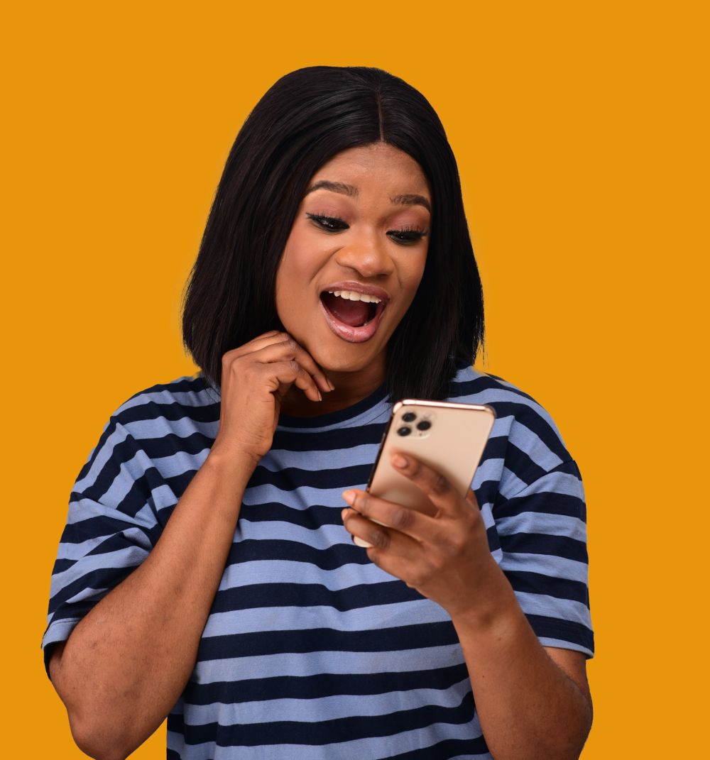 Smiling woman looking at her phone